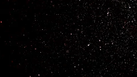Dust particles sparkling on black background with white light bokeh effect Stock Footage 138098041