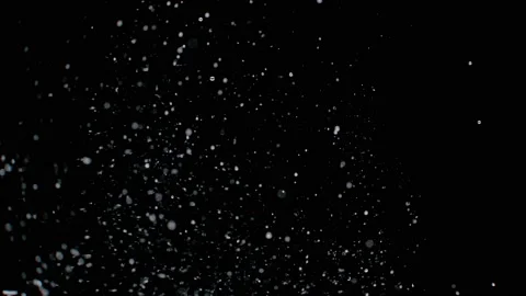 Dust particles sparkling on black background with white light bokeh effect Stock Footage 138098464