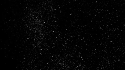 Dust particles sparkling on black background with white light bokeh effect Stock Footage 138100045