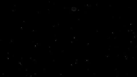 Dust particles sparkling on black background with white light bokeh effect Stock Footage 138101105
