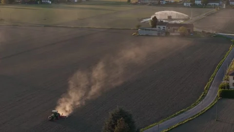 Dust plumes over drought affected farmland in Po Valley Italy drone parallax Stock Footage 335968807