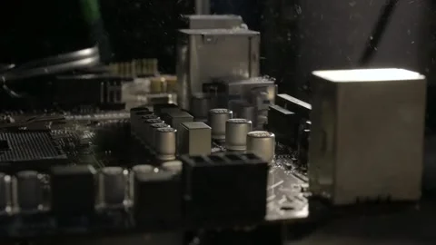 Dust Removal from Computer Motherboard Using Air Blower Stock Footage 300672378