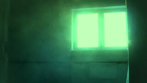 Dust in the room during construction. Green light from window Stock Footage 324911800