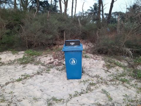 Dustbin on the beach.   Stock Photos