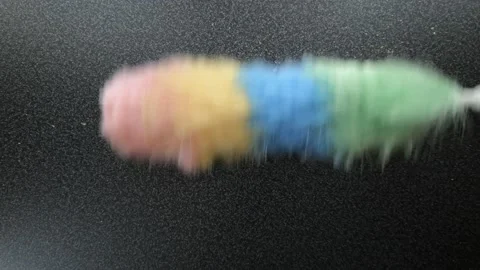 Dusting bread crumbs from table by static feather duster Stock Footage 121687611