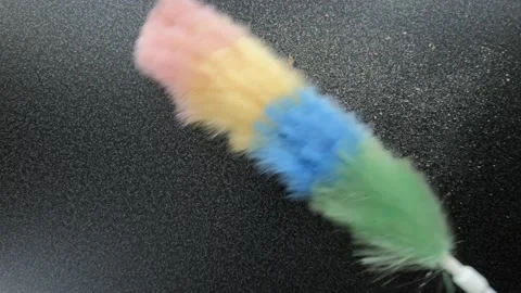 Dusting bread crumbs from table by static feather duster Stock Footage 121687740