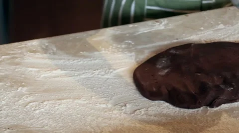 Dusting cookie dough with flour Stock Footage 41484404