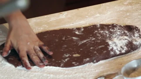 Dusting cookie dough with flour Stock Footage 41484495