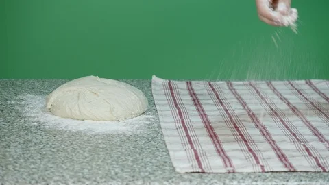 Dusting of flour for the preparation of typical natural products with cereals Stock Footage 126830833