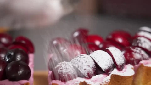 Dusting Fresh Cherry Tart with Powdered Sugar – Professional Pastry Decoration Stock Footage 337751246