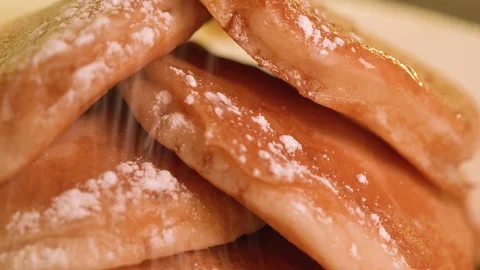 Dusting pancakes with icing sugar Close Shot Real Canadian Maple Syrup Stock Footage 95391965