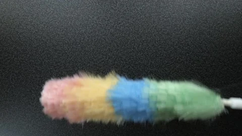 Dusting of table with static feather duster Stock Footage 121687217