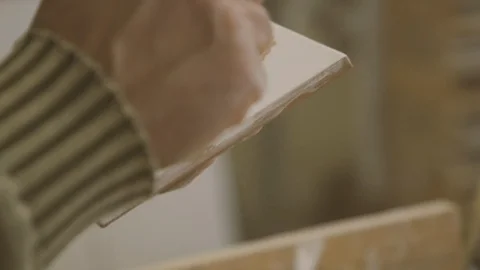 Dusting tiles with a brush Stock Footage 87131571