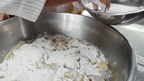 Dusting white flour over raw fish slices. Stock Footage 342516580