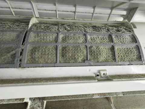 Dusty air conditioner filter 库存照片