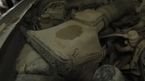 A dusty car air filter box with a wet oil stain Stock Footage 339684712