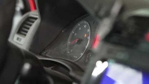 Dusty car dashboard instrument cluster with warning lights turned on. Stock Footage 341487565