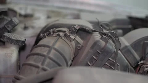 A dusty car maf sensor installed on air intake hose. Stock Footage 345911482