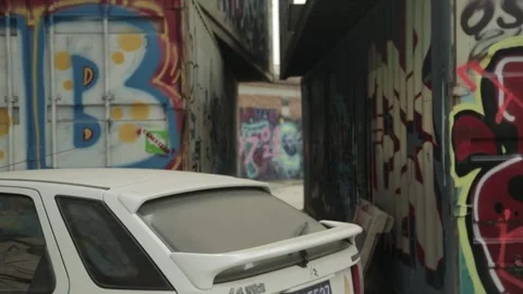 Dusty Car Parked Between Graffiti Walls in 798 Art District, Beijing China Stock Footage 341715579