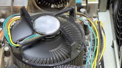 Dusty Computer Fan Spins with a Steady Low-Frequency Hum Stock Footage 329166807