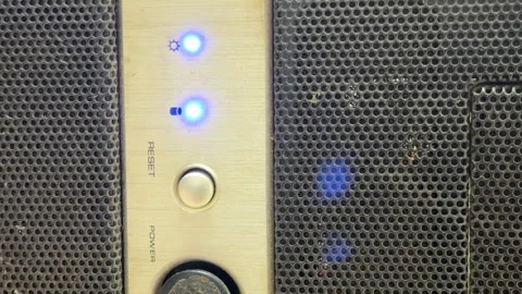 Dusty Computer Tower Whirs with a Rhythmic Electronic Hum Stock Footage 329166805