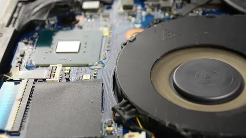 Dusty fan inside the laptop during servicing Stock Footage 135319230