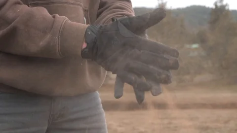 Dusty Gloves I Stock Footage