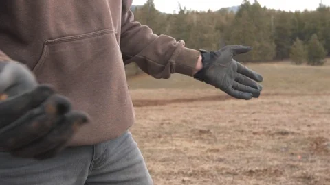 Dusty Gloves II Stock Footage 128085935