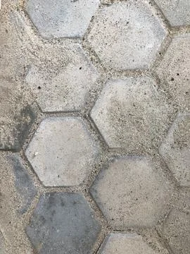 Dusty Hexagonal Concrete Paving Pattern for Urban Background Stock Photos