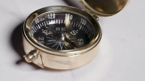 Dusty old antique compass true north navigation leadership concept Stock Footage 273991458
