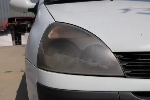 Dusty old headlight. Stock Photos