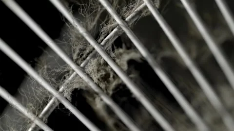 Dusty Oscillating Fan Grille in Close-Up Видео 344964401