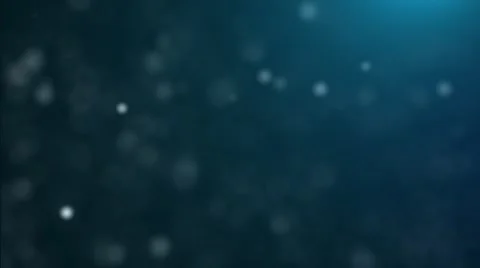 Dusty particles over blue background Stock Footage