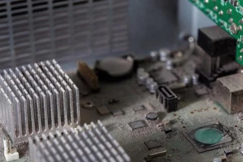 Dusty pc electronic hardware closeup with selective focus and blur Photos