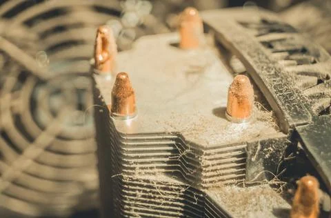 Dusty radiator of the cooling system of the computer processor. Dirt on the fins 스톡 사진