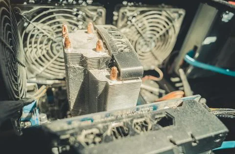 Dusty radiator of the cooling system of the computer processor. Dirt on the fins Stock Photos