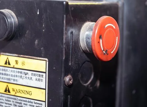 Dusty Red Button with Warning Words Foto stock