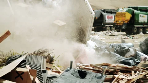 Dusty Rubble Falling Into Landfill Dump 4K 48FPS SLO-MO Stock Footage 201899478