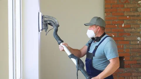 Dusty work inside a house under construction. Caucasian construction worker Stock-Footage 319210698