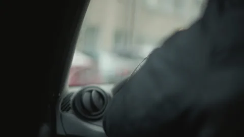 Dutch Angle Car Lover Driving With Hands On Steering Wheel Stock-Footage 310516924
