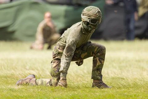 A Dutch army forward observer waiting for the helicopter to land Stock Photos