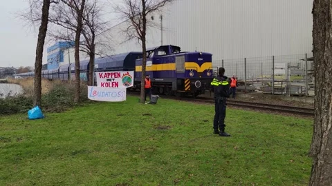 Dutch climate activists protesting against the transport and usage of coal Stock Footage 233881483