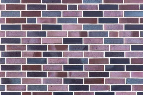 Dutch clinker dark bricks pattern in different tones of deep red and brown Stock Photos