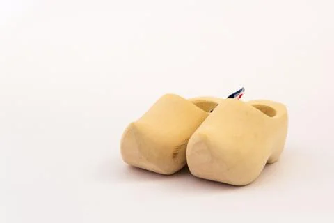 Dutch clogs without decorations on a white paper Stock Photos