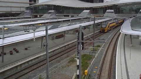 Dutch Double Decker train departing Stock Footage 112361269