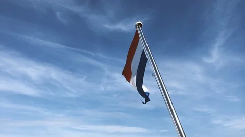 Dutch flag on a flag pole on the stern of a boat Stock Footage 91183701