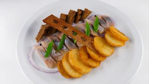 Dutch herring, served in Restaurant, decorated with crunchy toasts Vídeos de archivo 84263306