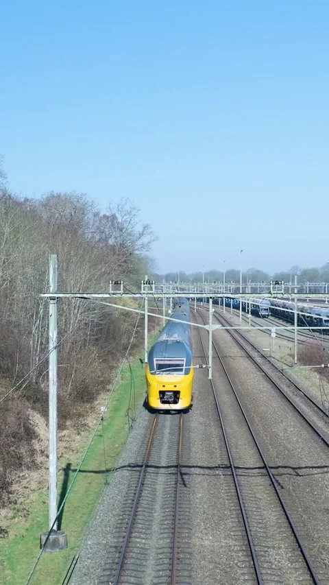 Dutch intercity passenger train passing under the camera Video stock 334423555