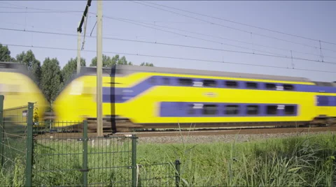 Dutch Intercity train passing by at high speed Stock Footage 42727486