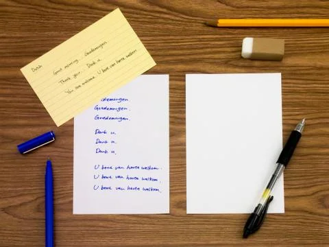 Dutch; Learning New Language Writing Words on the Notebook Stock Photos